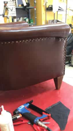 Fauteuil en cuir rénové